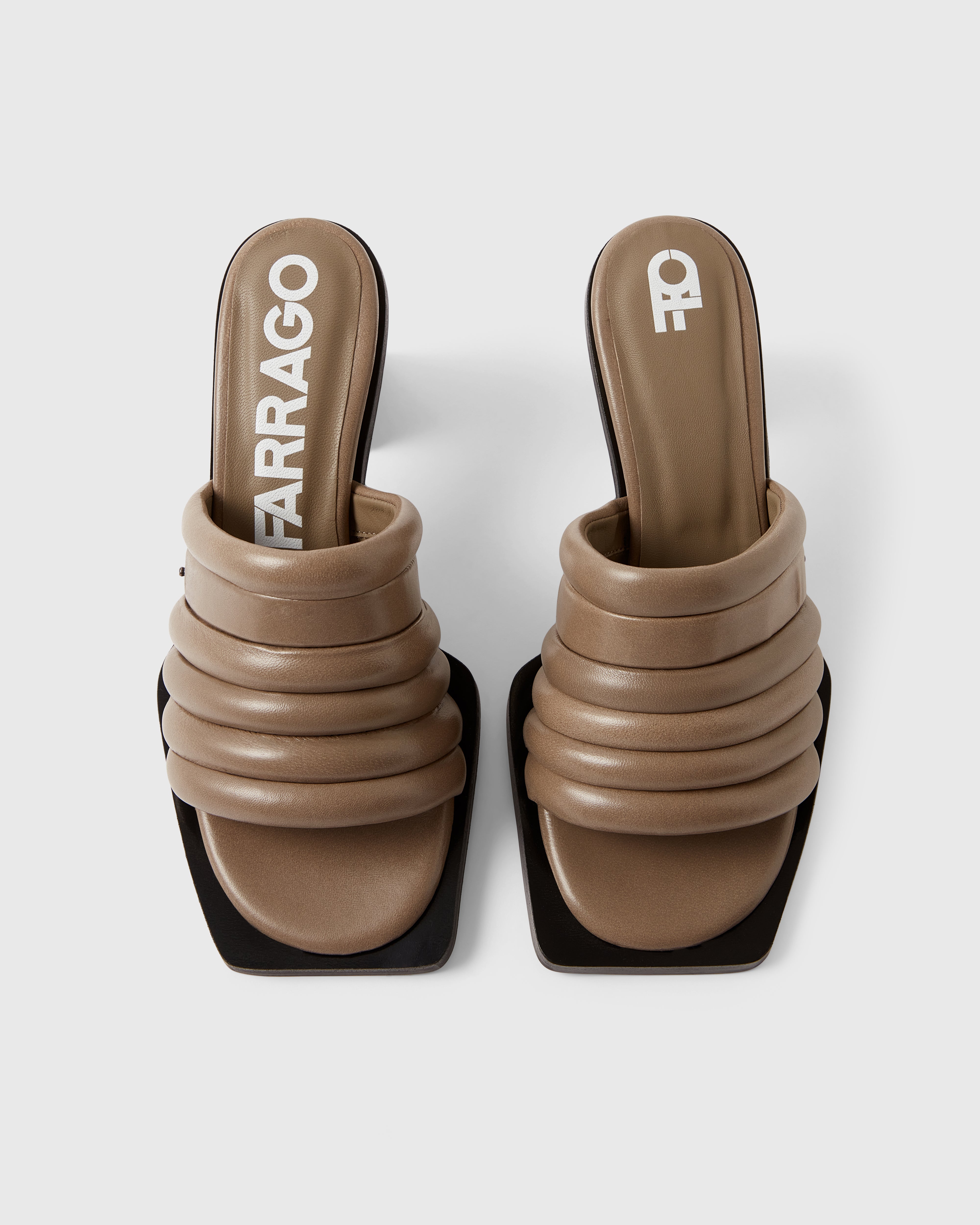 Farrago Charter sustainable designer leather heeled mules in truffle taupe.